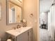 Bathroom vanity featuring modern fixtures, ample counter space, and convenient access to the bedroom at 445 Concord Way, Henderson, NV 89015