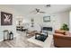 Open living area with an electric fireplace, modern decor, and dining area view at 445 Concord Way, Henderson, NV 89015