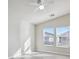 Bedroom features plenty of natural light with neutral walls, with vinyl floors and ceiling fan at 4675 Color Up Ct # 101, Las Vegas, NV 89122