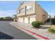 Attractive townhome with three-car garage and well-kept landscaping and ample parking at 4675 Color Up Ct # 101, Las Vegas, NV 89122