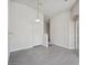 Spacious living room featuring vaulted ceilings and wood-look flooring at 4675 Color Up Ct # 101, Las Vegas, NV 89122