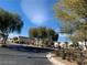 Street view of community with lush trees and well-maintained sidewalks at 4675 Color Up Ct # 101, Las Vegas, NV 89122