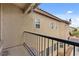 View of balcony with black metal railings, overlooking the community at 4858 Longshot Dr, Las Vegas, NV 89122