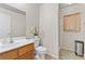 Neat bathroom with modern vanity, ceramic flooring, and shower featuring natural light at 4858 Longshot Dr, Las Vegas, NV 89122