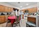 Functional kitchen with ample cabinet space, stainless steel microwave, and a cozy breakfast nook at 4858 Longshot Dr, Las Vegas, NV 89122