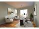This staged office features hardwood floors, neutral tones, and natural light at 5210 Villa Dante Ave, Las Vegas, NV 89141