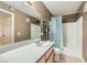 Bathroom featuring vanity, shower/tub combo with curtain, and a large mirror at 5241 Caspian Springs Dr # 203, Las Vegas, NV 89120