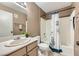 Bathroom featuring a shower-tub combo, modern sink, and neutral wall color at 5241 Caspian Springs Dr # 203, Las Vegas, NV 89120