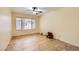 Bedroom featuring a large window offering generous natural light and wood floors at 5241 Caspian Springs Dr # 203, Las Vegas, NV 89120