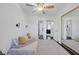 Bedroom featuring a daybed, stylish wall sconces and a mirrored closet at 526 Sellers Pl, Henderson, NV 89011