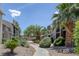Beautifully landscaped community with walking paths, trees and multiple units at 526 Sellers Pl, Henderson, NV 89011