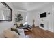 Staged living room with hardwood floors and neutral decor at 526 Sellers Pl, Henderson, NV 89011
