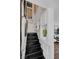 A stairway features black marble steps and shelving at 526 Sellers Pl, Henderson, NV 89011