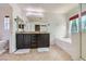 Bright bathroom featuring double vanity, soaking tub, and natural light at 529 Caribbean Palm Dr, Las Vegas, NV 89138