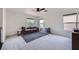 Upstairs loft area features neutral colored walls and carpet, windows and sitting area at 529 Caribbean Palm Dr, Las Vegas, NV 89138
