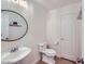 Stylish powder room with pedestal sink and neutral décor at 529 Caribbean Palm Dr, Las Vegas, NV 89138