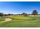 View of a meticulously maintained golf course with a sand trap at 5465 Cardinal Ridge Ct # 103, Las Vegas, NV 89149