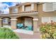Inviting outdoor patio features comfortable seating and a decorative rug, creating a relaxing space at 5465 Cardinal Ridge Ct # 103, Las Vegas, NV 89149