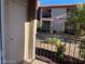 Balcony view with landscaped grounds and building at 5576 W Rochelle Ave # 13A, Las Vegas, NV 89103