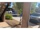 Exterior view of the parking area showcasing well-maintained landscaping and designated parking spots at 5576 W Rochelle Ave # 13A, Las Vegas, NV 89103