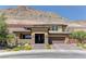 Beautiful two-story home boasts desert landscaping and a mountain backdrop, with a three-car garage at 5635 Mesa Mountain Dr, Las Vegas, NV 89135