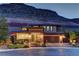 Beautiful two-story home with a well-manicured front yard and a backdrop of scenic mountain views at 5635 Mesa Mountain Dr, Las Vegas, NV 89135