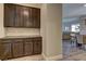 Hallway view of built-in cabinets and counter space, perfect for a butler's pantry or storage at 5635 Mesa Mountain Dr, Las Vegas, NV 89135