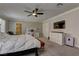 Inviting main bedroom with a ceiling fan and a stylish vanity area at 5635 Mesa Mountain Dr, Las Vegas, NV 89135