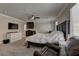 Relaxing main bedroom featuring a ceiling fan, TV, and spacious layout at 5635 Mesa Mountain Dr, Las Vegas, NV 89135