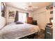 Nicely sized bedroom with a ceiling fan, carpet flooring, and neutral paint at 5824 Kane Holly St, Las Vegas, NV 89130