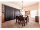 Dining area featuring a chandelier and large windows for plenty of natural light at 5824 Kane Holly St, Las Vegas, NV 89130