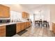 Kitchen with stainless appliances and a view into the dining area at 5824 Kane Holly St, Las Vegas, NV 89130