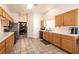 Functional kitchen featuring ample counter space and stainless steel appliances at 5824 Kane Holly St, Las Vegas, NV 89130