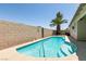 Inviting in-ground pool in a private backyard setting, perfect for relaxation at 5824 Kane Holly St, Las Vegas, NV 89130