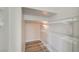 Closet featuring built-in shelving, lighting, and modern wood-look flooring at 5931 Allanche Ave, Las Vegas, NV 89141