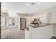 Open-concept kitchen featuring stainless steel appliances, granite countertops, and seamless access to the dining area at 5931 Allanche Ave, Las Vegas, NV 89141