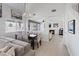 Open concept dining area featuring stylish decor, a dining table, and seamless access to the living room at 600 Beresford Ave, Las Vegas, NV 89123