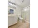 Bathroom featuring a single vanity, toilet, and a shower with sliding glass doors at 6120 Desert Haven Rd, Las Vegas, NV 89130