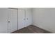 Bedroom featuring a closet with sliding doors and neutral carpeting at 6120 Desert Haven Rd, Las Vegas, NV 89130