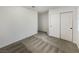 Bedroom featuring a closet with sliding doors and neutral carpeting at 6120 Desert Haven Rd, Las Vegas, NV 89130