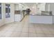 Large kitchen featuring white cabinets, granite countertops, and stainless steel appliances at 6120 Desert Haven Rd, Las Vegas, NV 89130