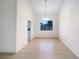 Bright living room with tile flooring and a modern chandelier above at 6120 Desert Haven Rd, Las Vegas, NV 89130
