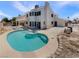 Backyard showcasing a sparkling pool and spa, plus rear exterior view at 6120 Desert Haven Rd, Las Vegas, NV 89130