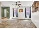 Spacious living room features wood floors and many windows providing natural light at 6581 Netherseal Ave, Las Vegas, NV 89139