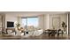 Bright and spacious living room with city skyline views, modern furnishings and herringbone floors at 700 W Carson Ave # 2307, Las Vegas, NV 89106