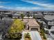 An aerial view of a house highlighting desert landscaping and mountain views in black and white at 7206 Laramie Ave, Las Vegas, NV 89113