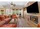 Spacious living room with fireplace and large windows for natural light at 7206 Laramie Ave, Las Vegas, NV 89113