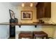 Cozy home office featuring built-in desk, storage, and comfortable seating at 7206 Laramie Ave, Las Vegas, NV 89113