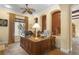Bright home office featuring custom woodwork, decorative ceilings, and abundant natural light at 7206 Laramie Ave, Las Vegas, NV 89113
