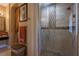Tiled shower featuring glass door and neutral tones at 7206 Laramie Ave, Las Vegas, NV 89113